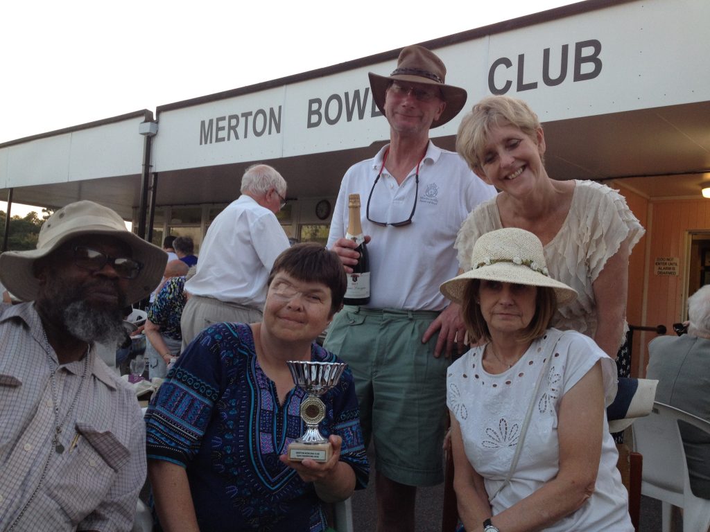 The team photo of MSSC quiz champions at Merton Bowling Club Fun Day 2019. 5 MSSC celebrating with one member holding their winners' medal.